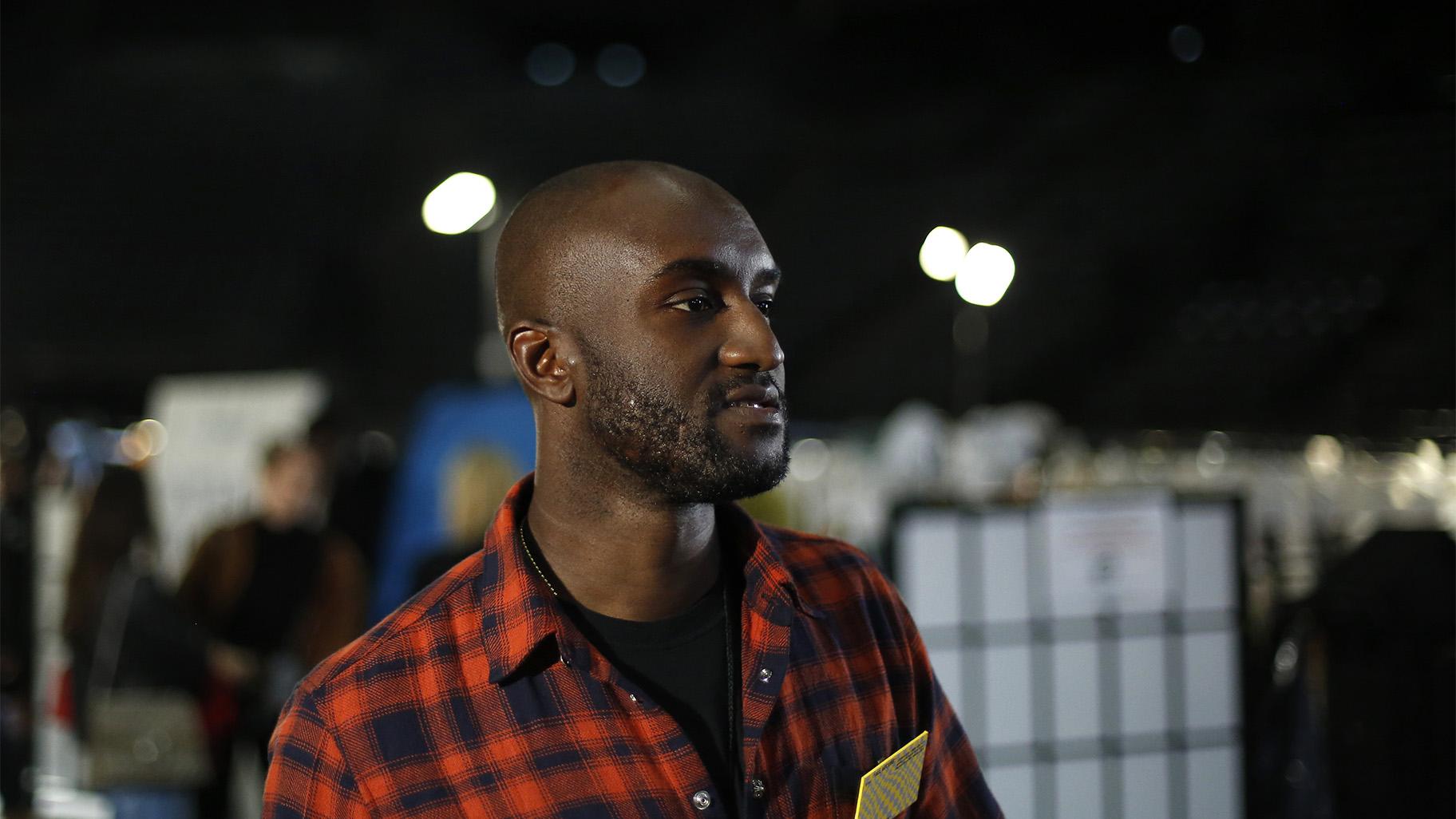 Designer Virgil Abloh walks backstage prior to his Off-White ready to wear Fall-Winter 2019-2020 collection, that was presented in Paris, Thursday, Feb. 28, 2019. (AP Photo / Thibault Camus, File )