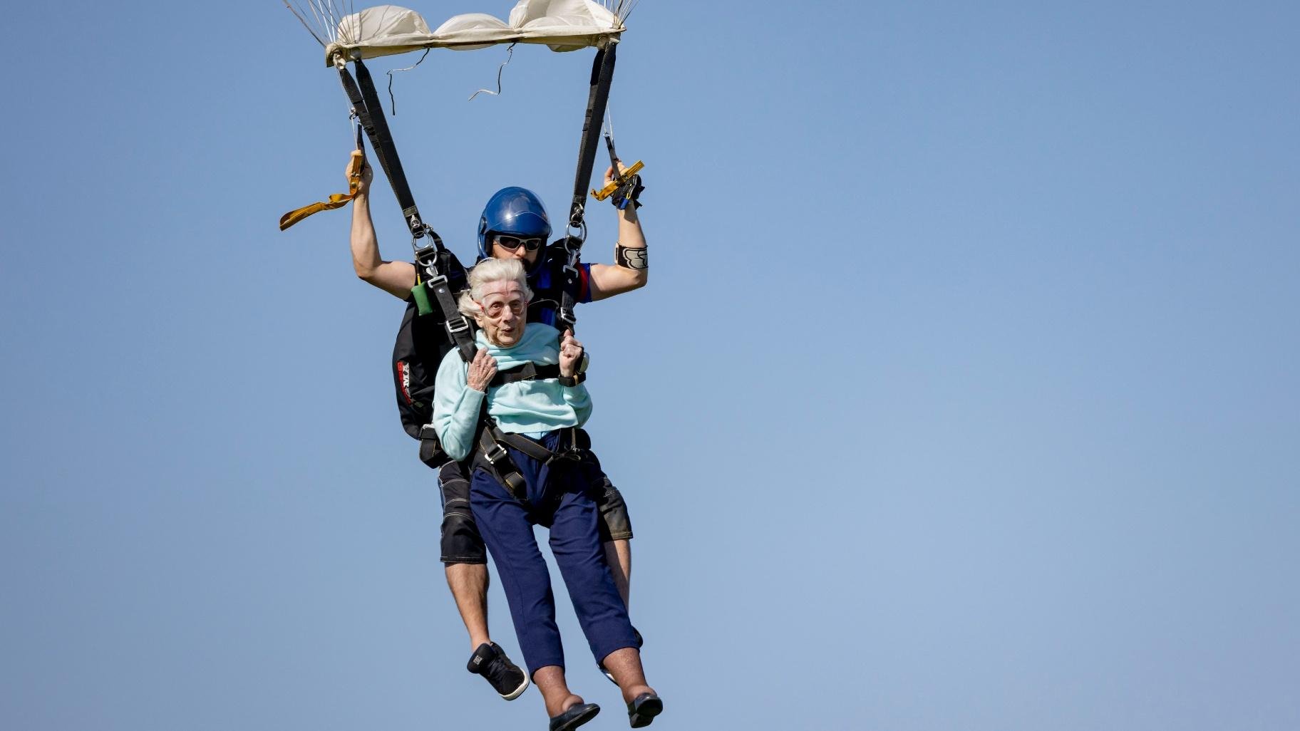 Dorothy Hoffner, 104, becomes the oldest person in the world to skydive with tandem jumper Derek Baxter on Sunday, Oct. 1, 2023, at Skydive Chicago in Ottawa, Ill. (Brian Cassella / Chicago Tribune via AP)