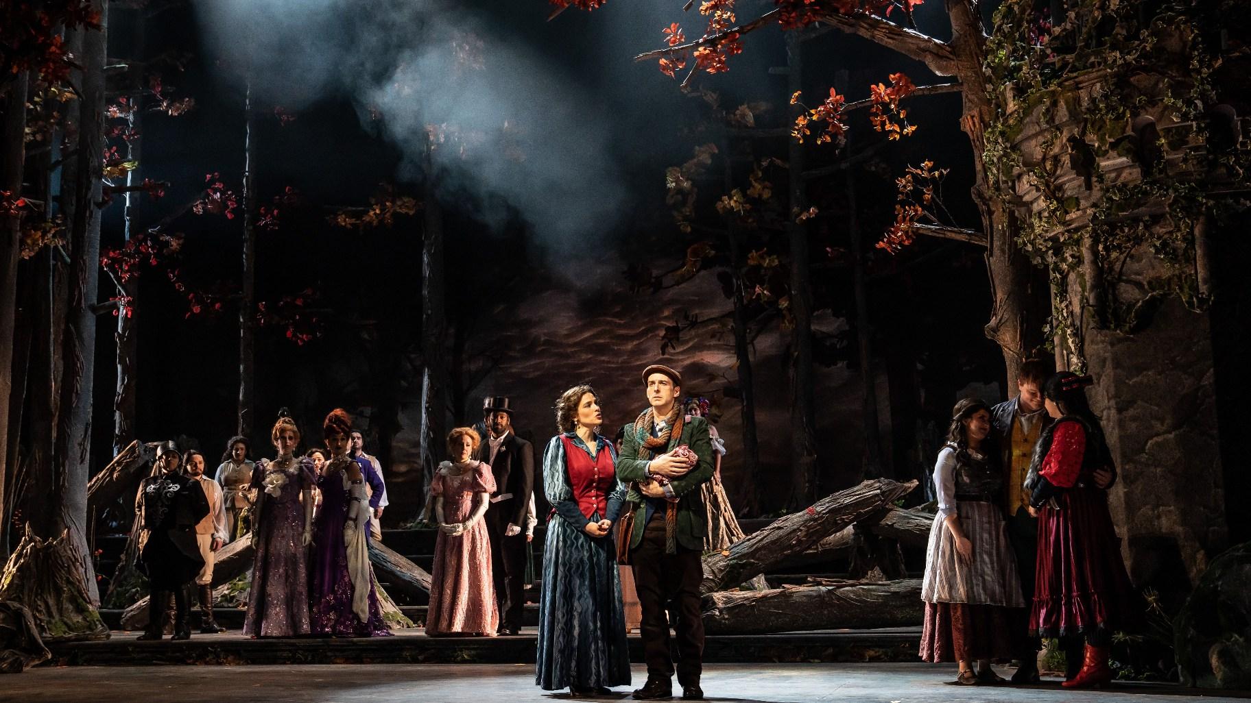 Sarah Bockel (center, left) plays the Baker’s Wife and Stephen Schellhardt is the Baker in Paramount Theatre’s “Into the Woods.” (Credit: Liz Lauren)