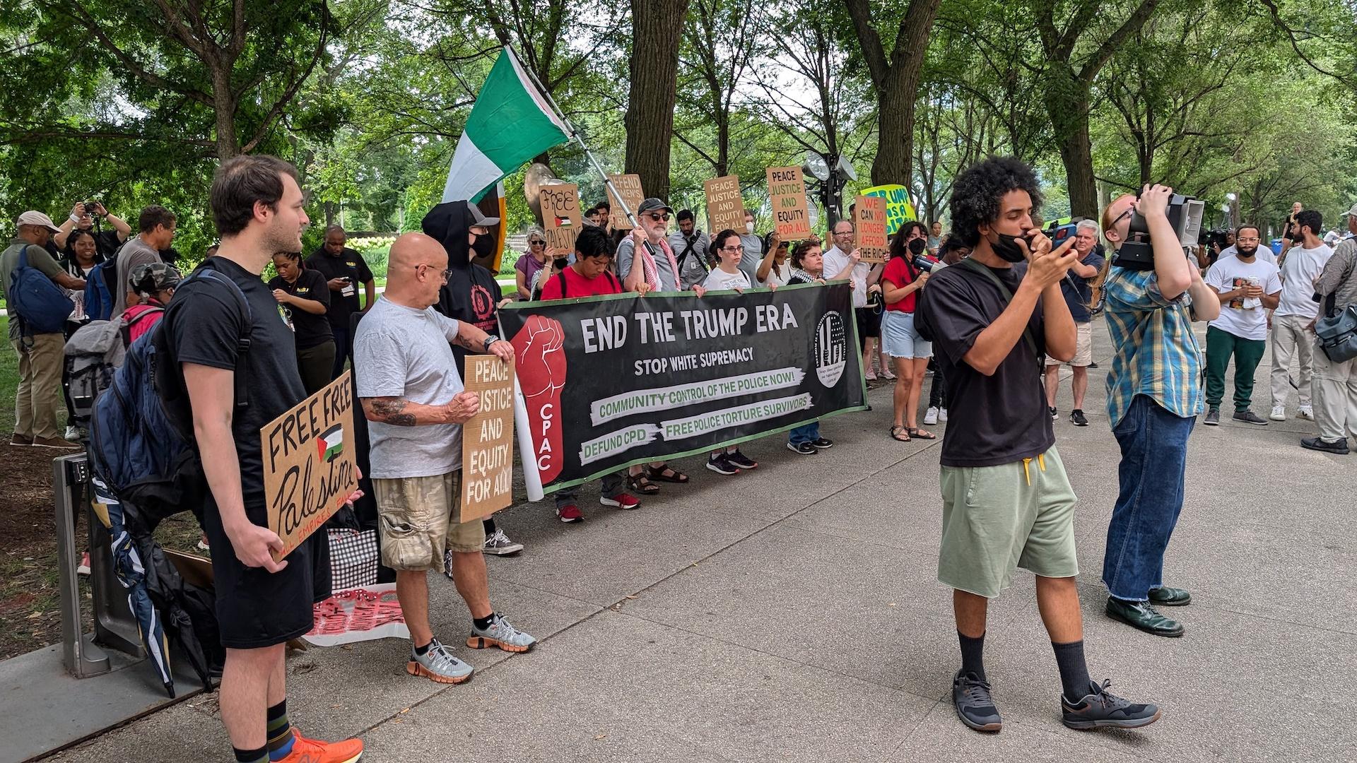 Protesters gathered outside Hilton Chicago, where former president Donald Trump was set to speak Wednesday, July 31, 2024. (Matt Masterson / WTTW News)