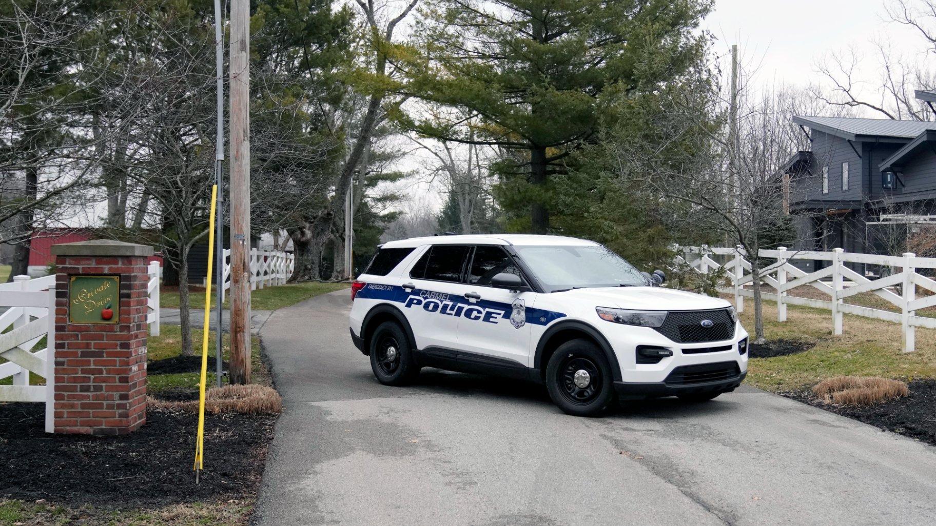 Police secure the entrance to the neighborhood of former Vice President Mike Pence’s Indiana home, Friday, Feb. 10, 2023 in Carmel, Ind. (AP Photo / Michael Conroy)