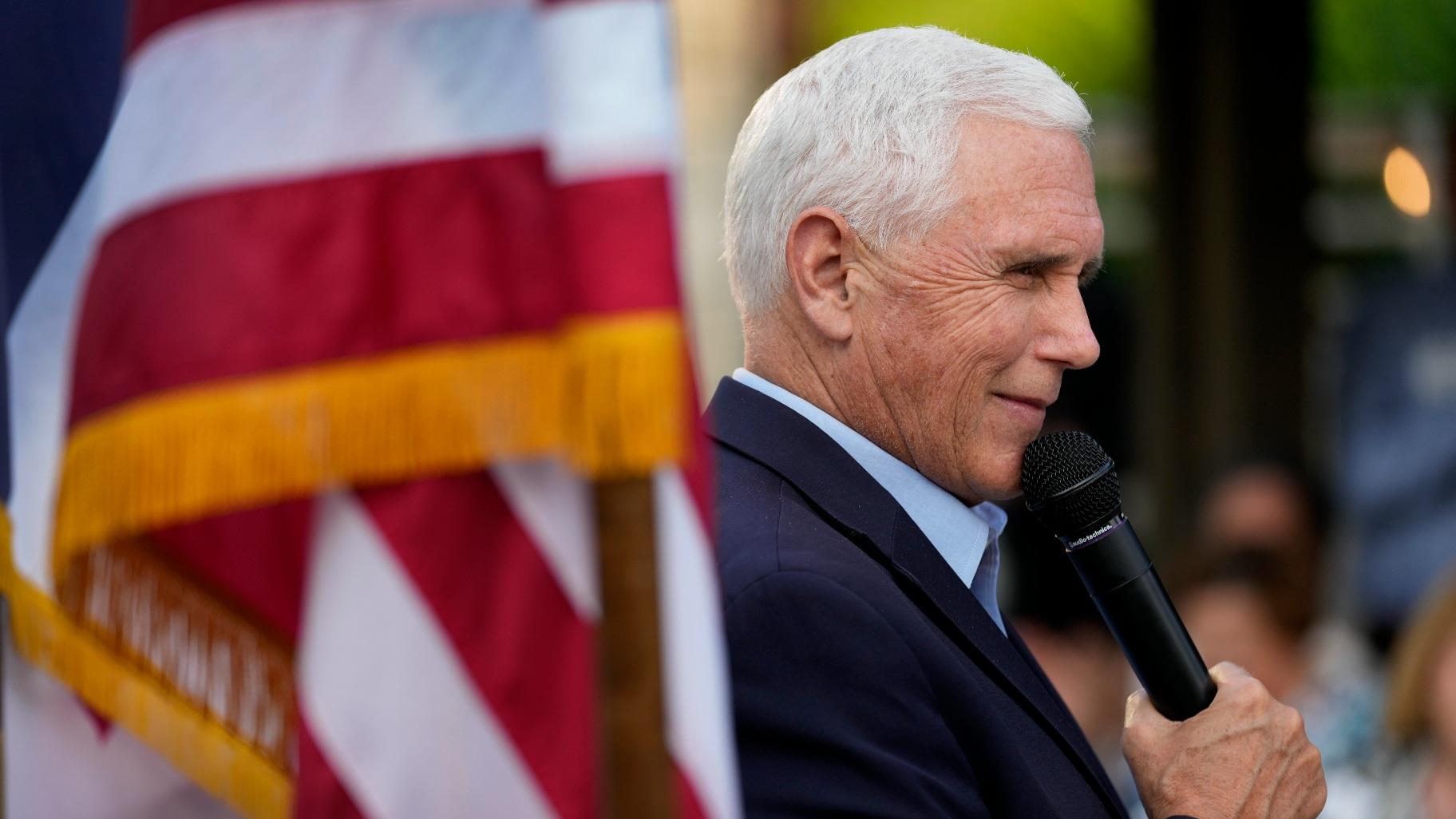 Former Vice President Mike Pence talks with local residents during a meet and greet on May 23, 2023, in Des Moines, Iowa. (AP Photo / Charlie Neibergall)