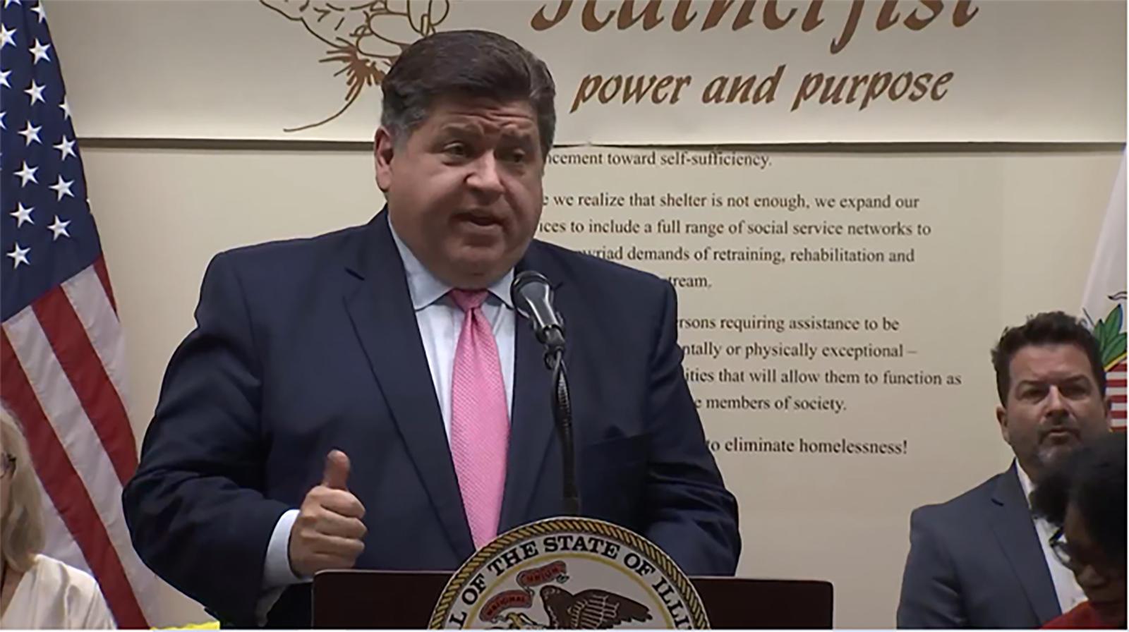 Gov. J.B. Pritzker answers questions from reporters after signing legislation establishing a permanent Interagency Task Force on Homelessness on July 26, 2023. (Credit: Illinois.gov)