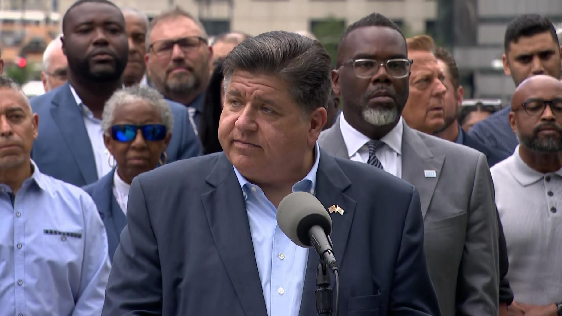 Illinois Gov. JB Pritzker speaks alongside dozens of elected officials about threats to send the National Guard to Chicago in a news conference on Aug. 25, 2025. (WTTW News)