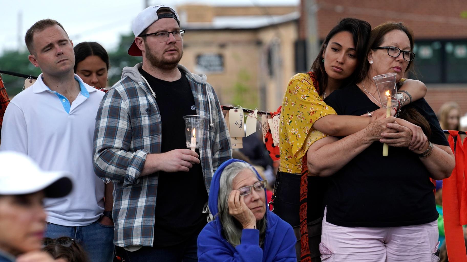 Residents from around the Highland Park, Ill., area listen during a vigil in Highwood, Ill., for the victims of Monday's Highland Park Fourth of July parade mass shooting, Wednesday, July 6, 2022. (AP Photo / Charles Rex Arbogast)