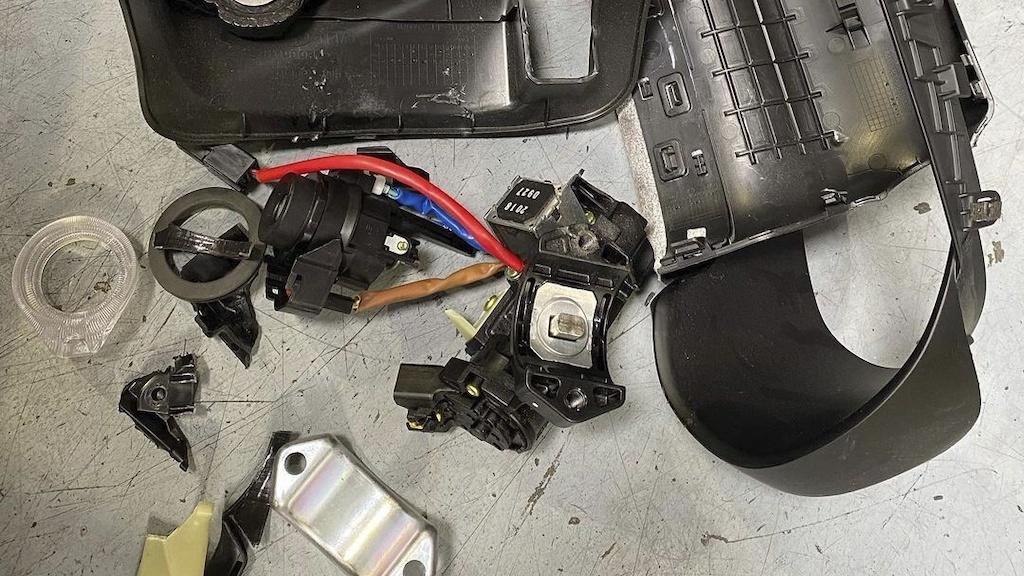 This photo provided by Zenith Auto Care shows damaged car parts that need to be replaced after the car was stolen, on April 20, 2023, in North Las Vegas. A sharp uptick in thefts of Hyundais and Kias over the paast two years has been linked to viral videos posted to TikTok and other social media platforms that teach people how to exploit a security vulnerability to steal the cars. (Zenith Auto Care via AP)