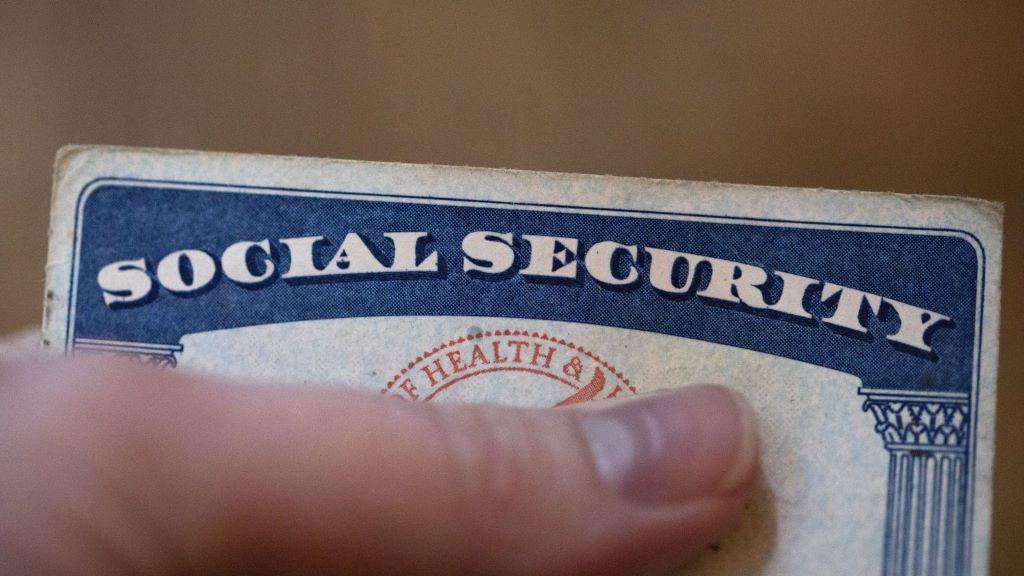 A Social Security card is displayed on Oct. 12, 2021, in Tigard, Ore. Millions of Social Security recipients will soon learn just how high a boost they'll get in their benefits next year. (AP Photo/Jenny Kane, File)