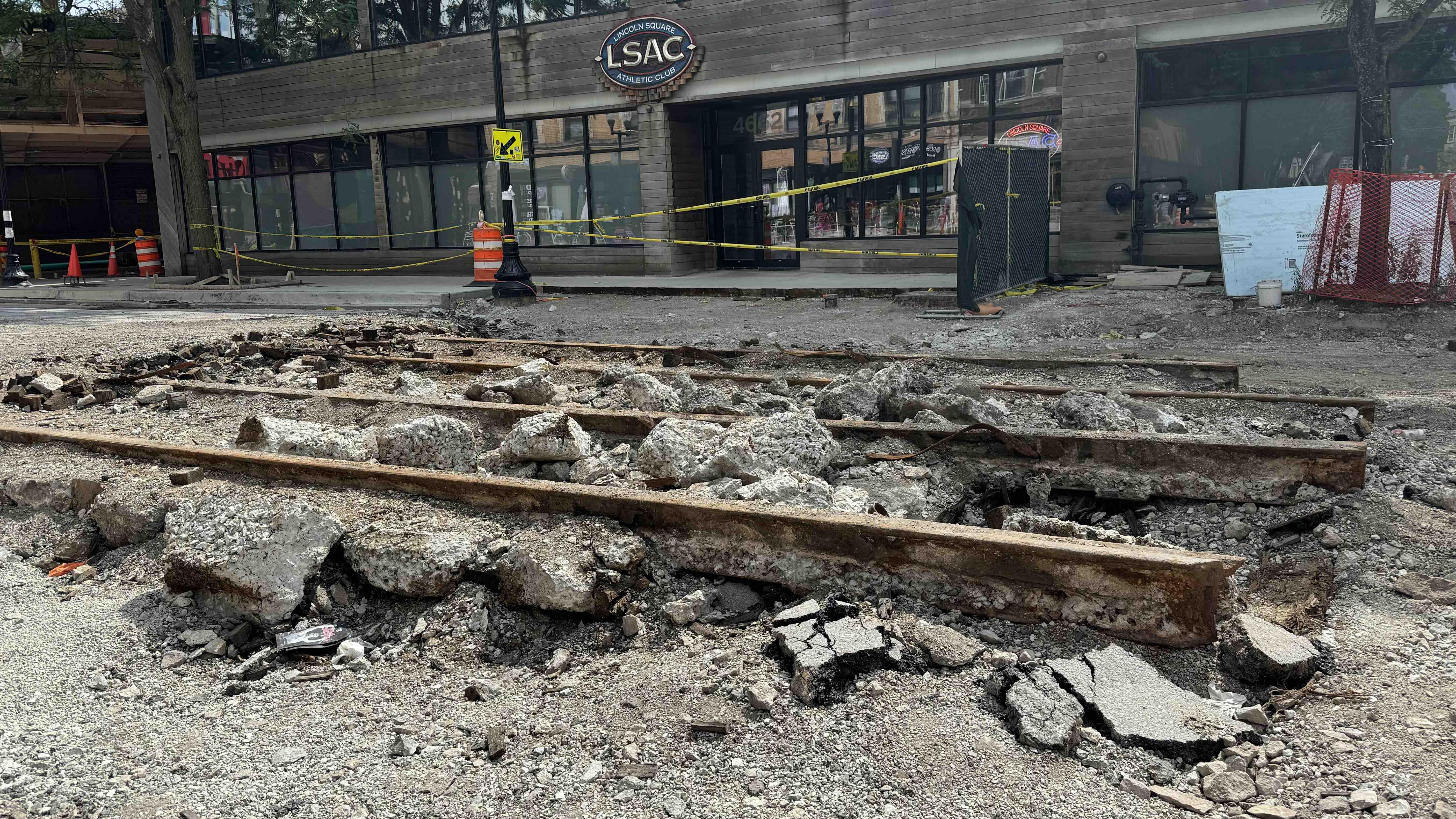 Exposed streetcar rails are a blast from Chicago's transit past. Seen in the 4600 block of North Lincoln Avenue in the Lincoln Square neighborhood. (Patty Wetli / WTTW News)