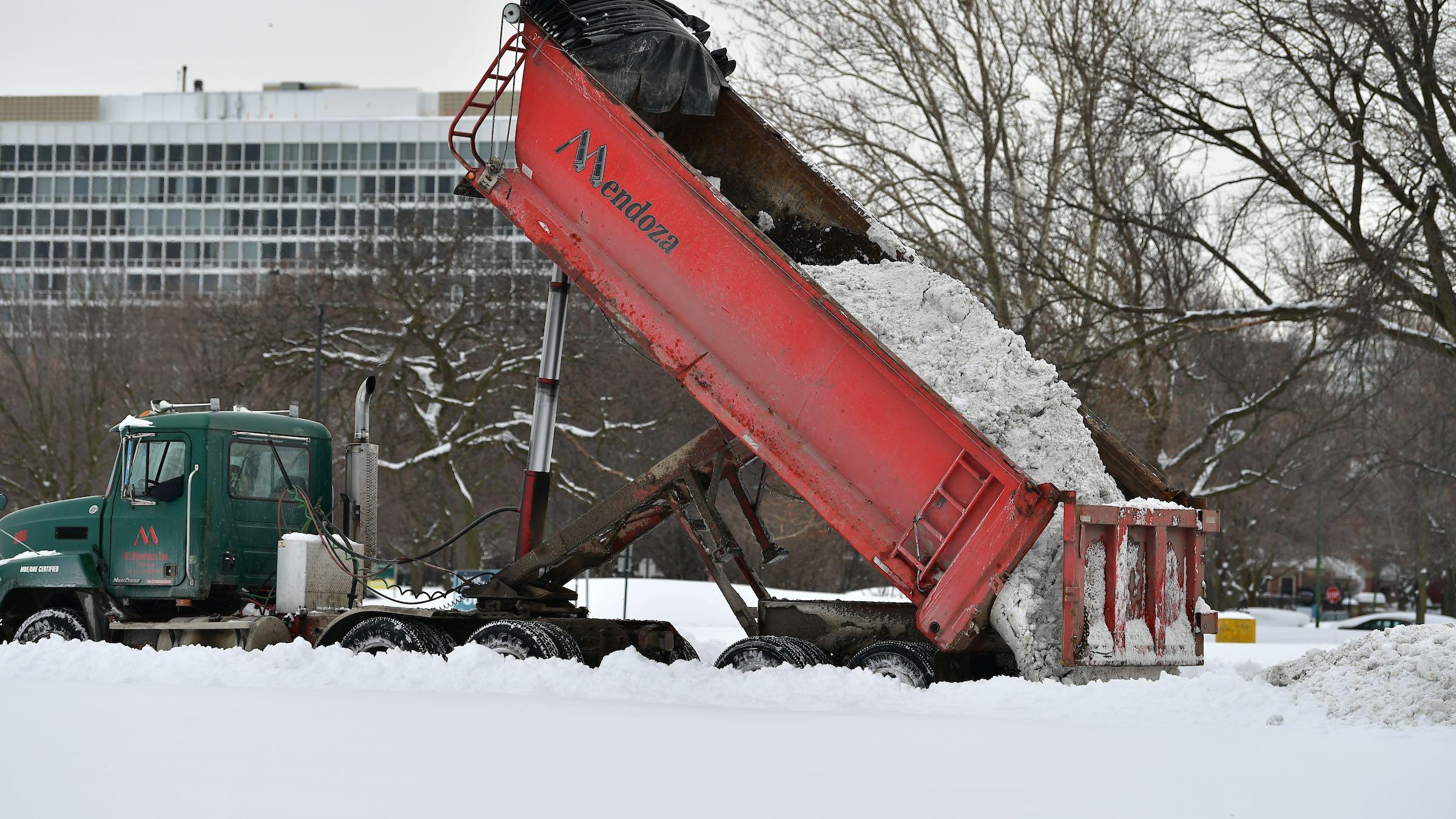 Chicago has deployed dump trucks to relocate snow, which has piled high in recent weeks. (Courtesy of Department of Streets and Sanitation)