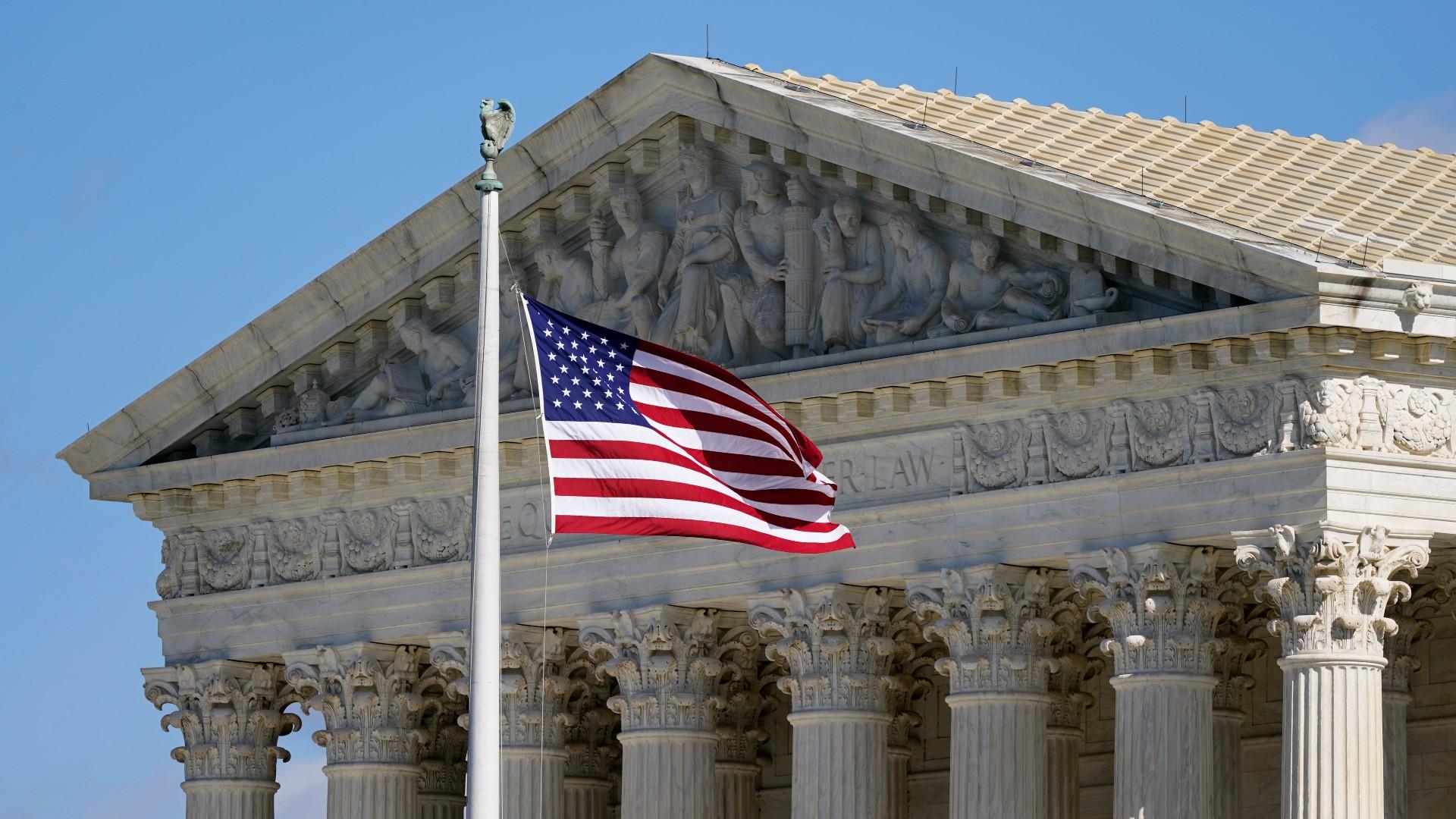 An American flag waves in front of the Supreme Court building on Capitol Hill in Washington, Nov. 2, 2020. (AP Photo / Patrick Semansky, File)