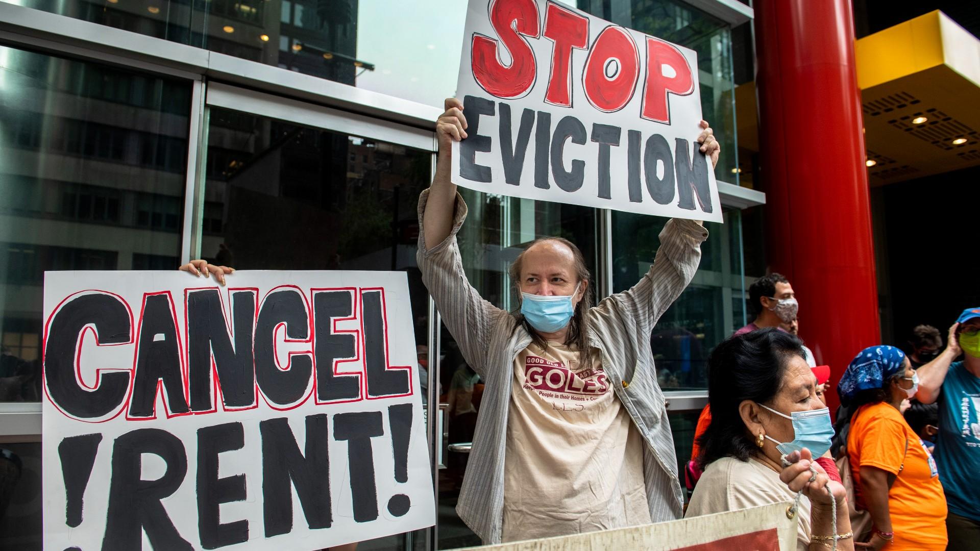 In this Aug. 4, 2021, file photo, housing advocates protest the eviction moratorium in New York. (AP Photo / Brittainy Newman, File)