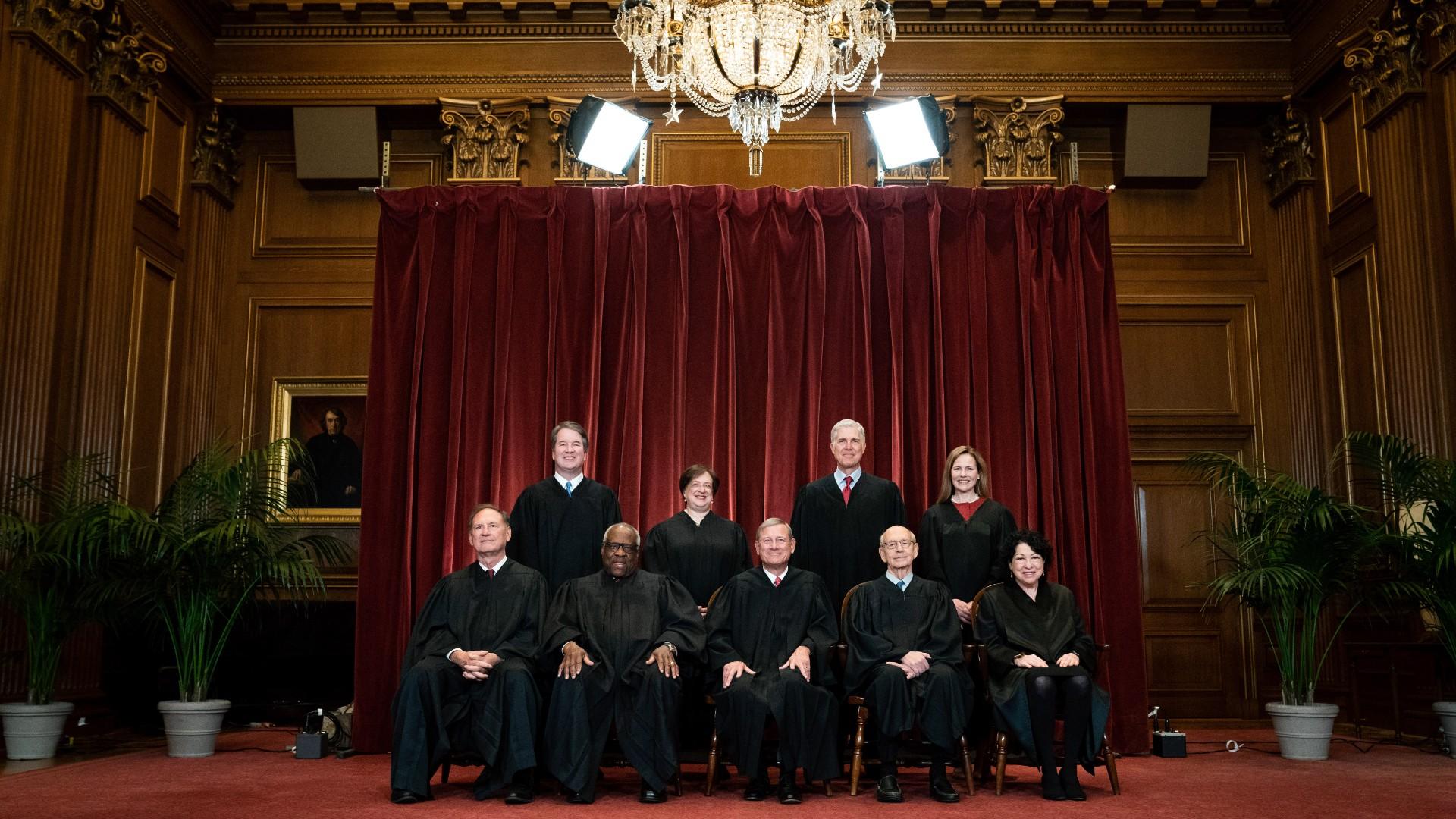 Members of the Supreme Court pose for a group photo at the Supreme Court in Washington, April 23, 2021. Seated from left are Associate Justice Samuel Alito, Associate Justice Clarence Thomas, Chief Justice John Roberts, Associate Justice Stephen Breyer and Associate Justice Sonia Sotomayor, Standing from left are Associate Justice Brett Kavanaugh, Associate Justice Elena Kagan, Associate Justice Neil Gorsuch and Associate Justice Amy Coney Barrett. (Erin Schaff / The New York Times via AP, Pool, File)