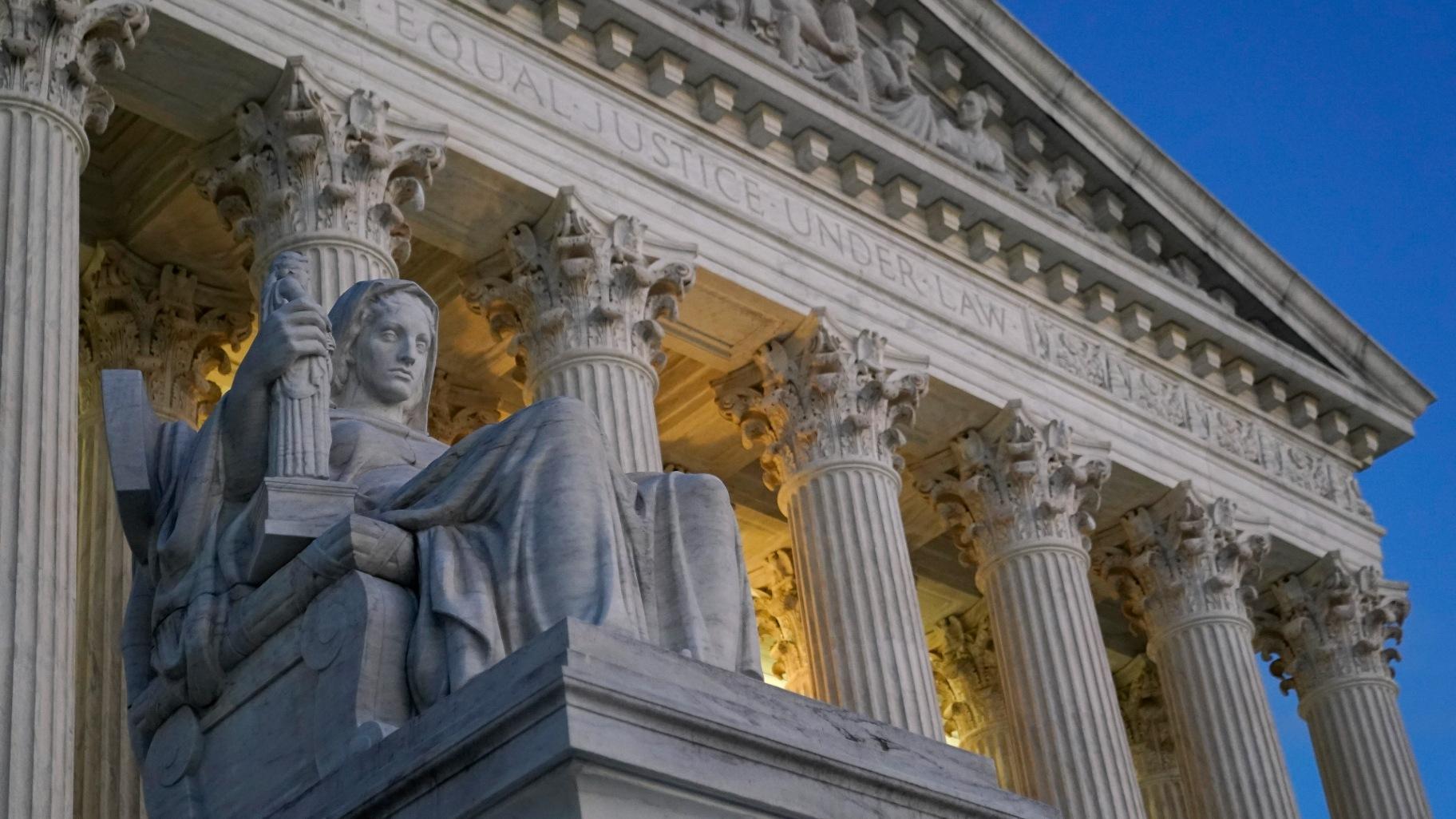 FILE - Light illuminates part of the Supreme Court building on Capitol Hill in Washington, Wednesday, Nov. 16, 2022. (AP Photo / Patrick Semansky, File)