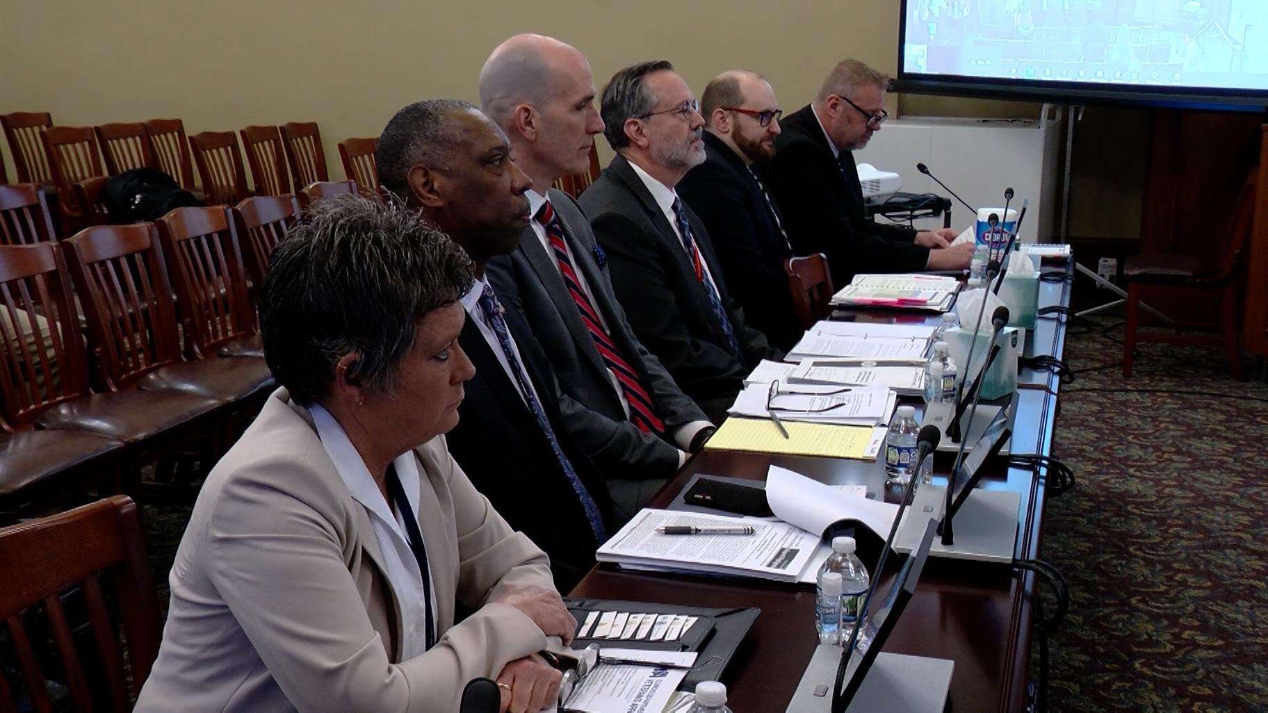 Illinois Department of Veterans’ Affairs Director Terry Prince (third from left) testifies before the Illinois Legislative Audit Commission at the Capitol in March 2024. He was testifying regarding an audit of a deadly COVID-19 outbreak at the LaSalle Veterans Home that killed 36 residents in 2020. (Andrew Campbell / Capitol News Illinois)