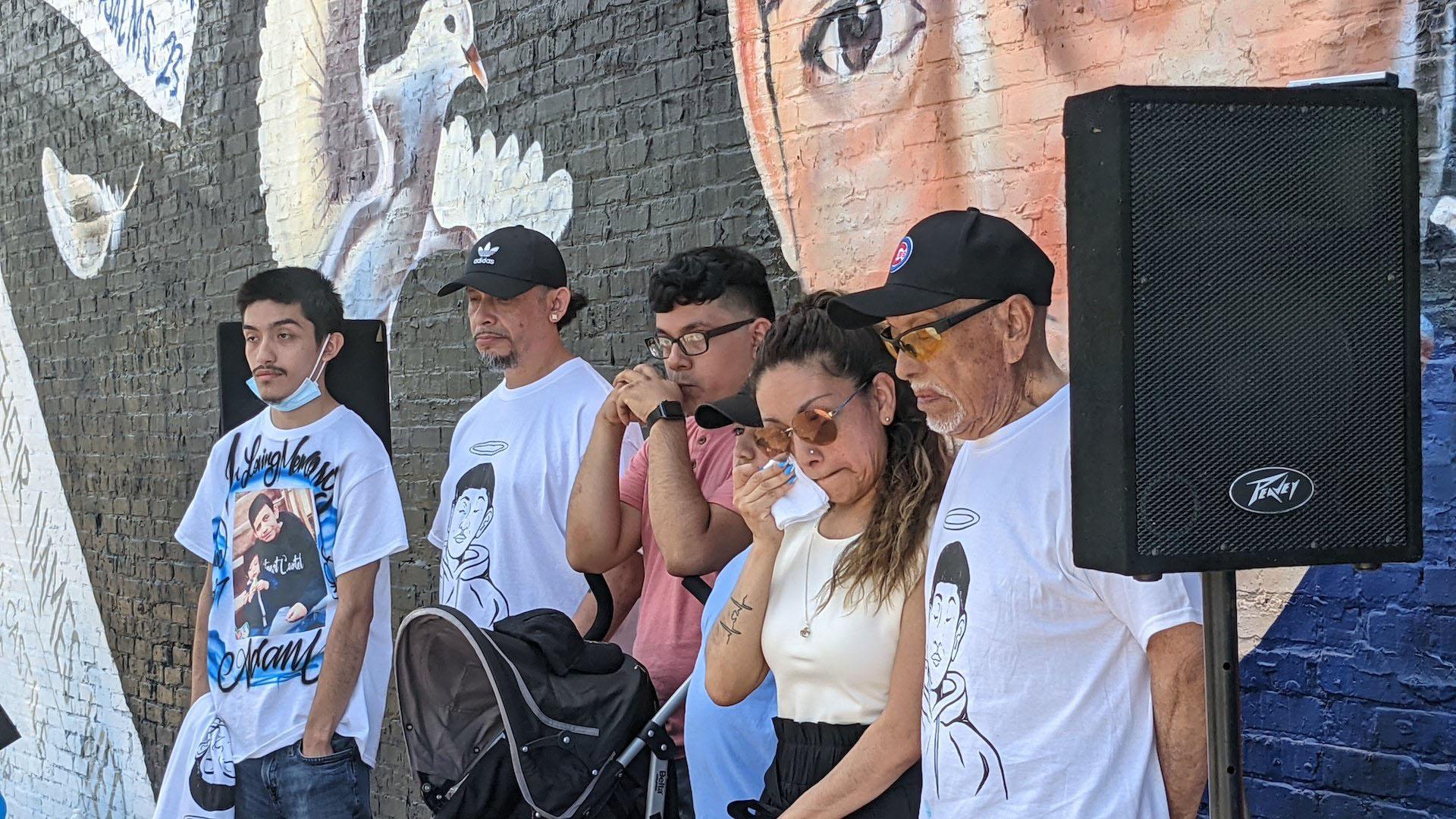 Adam Toledo’s mother Betty, second from right, wipes away tears as family members of the 13-year-old fatally shot by police on March 29, 2021 announce the launch of a nonprofit honoring their son and brother on May 26, 2021. (Matt Masterson / WTTW News)