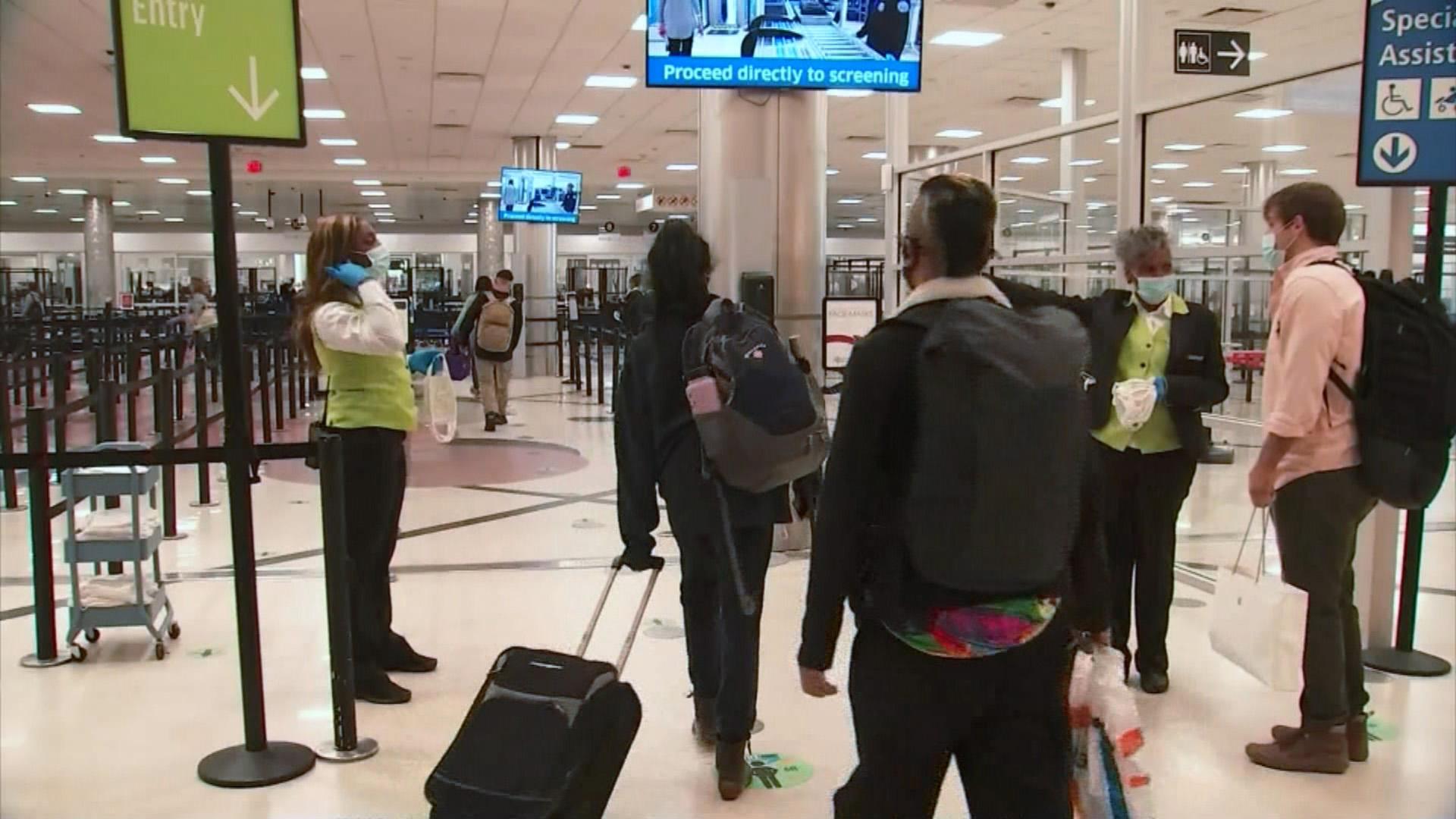 Public health officials have been urging Americans to reconsider their travel plans this holiday week amid a resurgence of COVID-19 infections. (WTTW News via CNN)