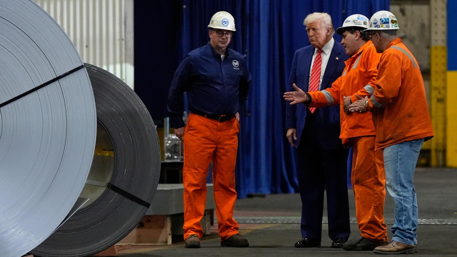 President Donald Trump talks to workers as he tours U.S. Steel Corporation's Mon Valley Works-Irvin plant, Friday, May 30, 2025, in West Mifflin, Pa. (AP Photo / Julia Demaree Nikhinson)