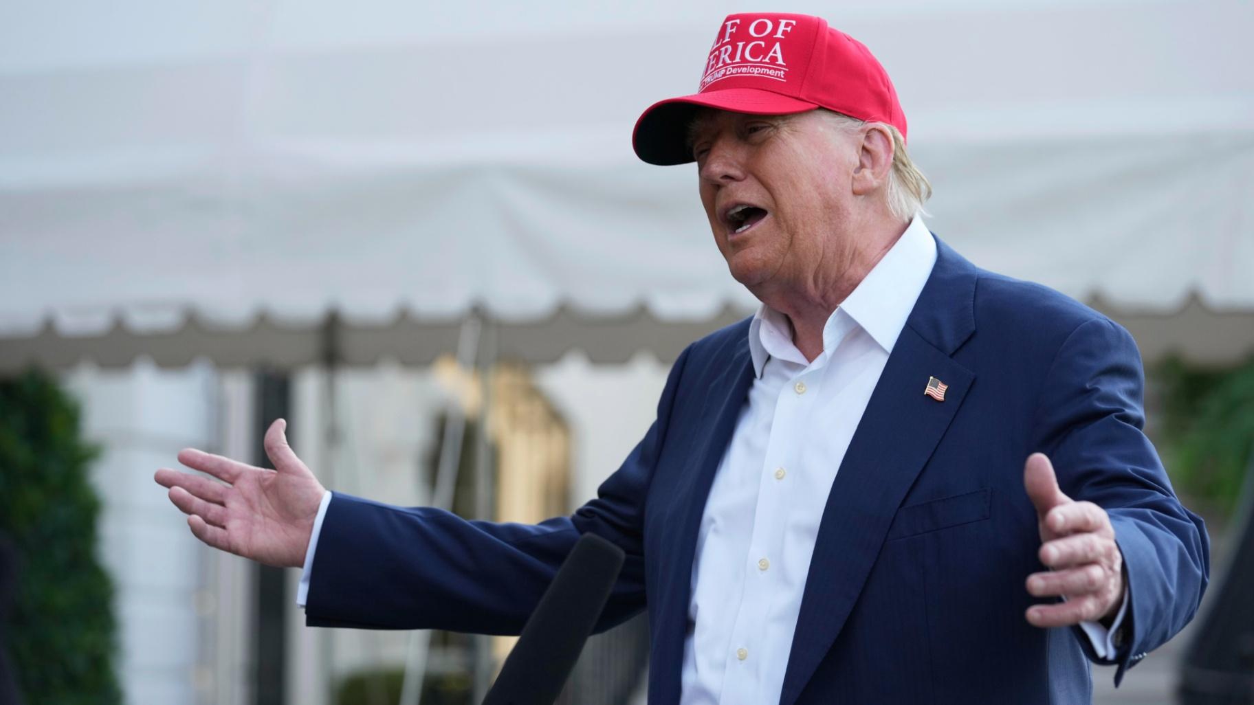 President Donald Trump speaks to the media before walking across the South Lawn of the White House to board Marine One en route to Joint Base Andrews, Md., and on to Florida, Tuesday, July 1, 2025, in Washington. (AP Photo / Mark Schiefelbein)