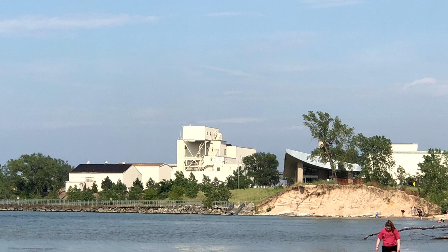 U.S. Steel Midwest Plant on the shore of Lake Michigan, with the Indiana Dunes Portage Lakefront and Riverwalk Trail in the foreground, in 2019. (Patty Wetli / WTTW News)