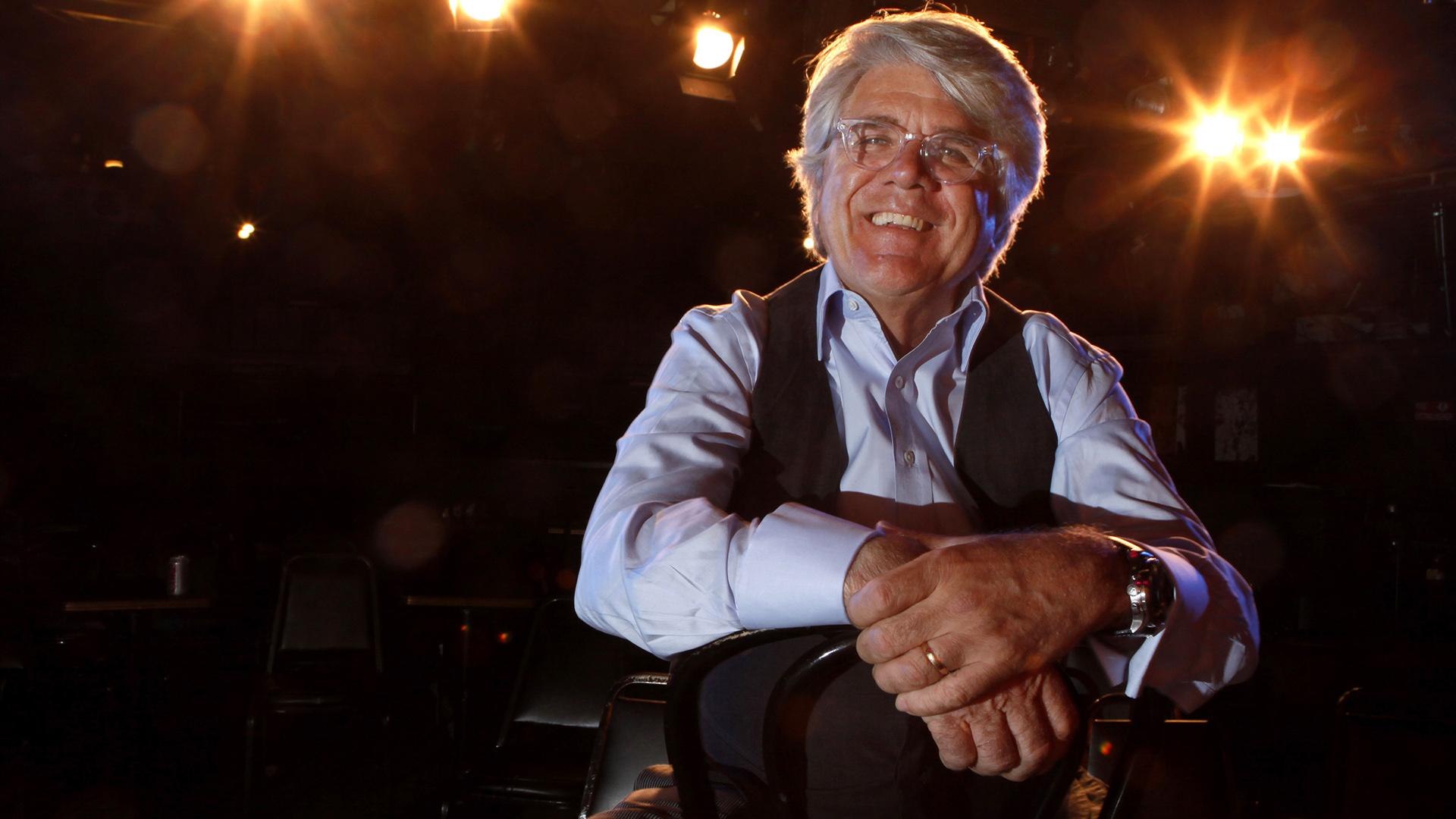 In this Nov. 18, 2009, file photo, co-chairman and chief executive officer Andrew Alexander sits onstage at The Second City in Chicago. Alexander said Friday, June 5, 2020, that he is stepping down after a former performer leveled accusations of racism against the comedy institution. (AP Photo / Charles Rex Arbogast, File)