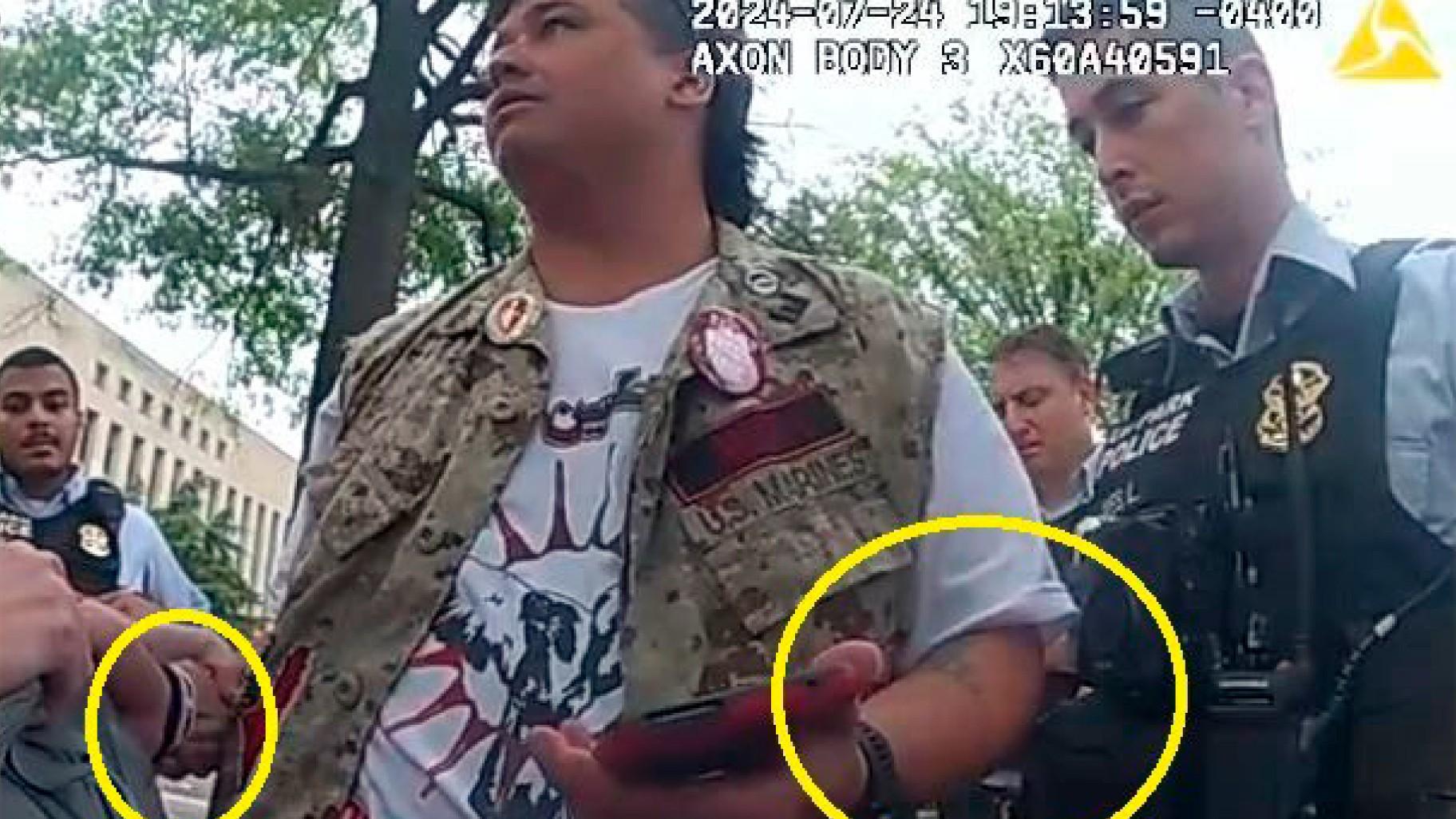 This image from police-worn body camera, and provided and annotated by the Justice Department, in the affidavit to support the criminal complaint and arrest warrant for Zachary Allen Kam, shows Kim during his arrest July 24, 2024, in Washington. (Department of Justice via AP)