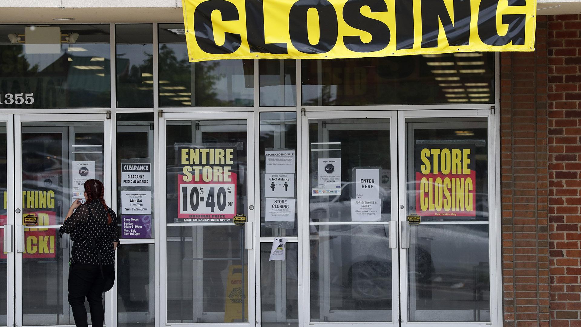 A woman walks into a closing Gordmans store, Thursday, May 28, 2020, in St. Charles, Missouri. (AP Photo / Jeff Roberson)