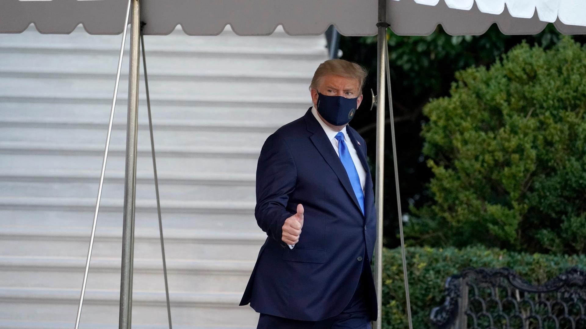 President Donald Trump gives a thumbs-up as he leaves the White House to go to Walter Reed National Military Medical Center after he tested positive for COVID-19, Friday, Oct. 2, 2020, in Washington. (AP Photo / Alex Brandon)