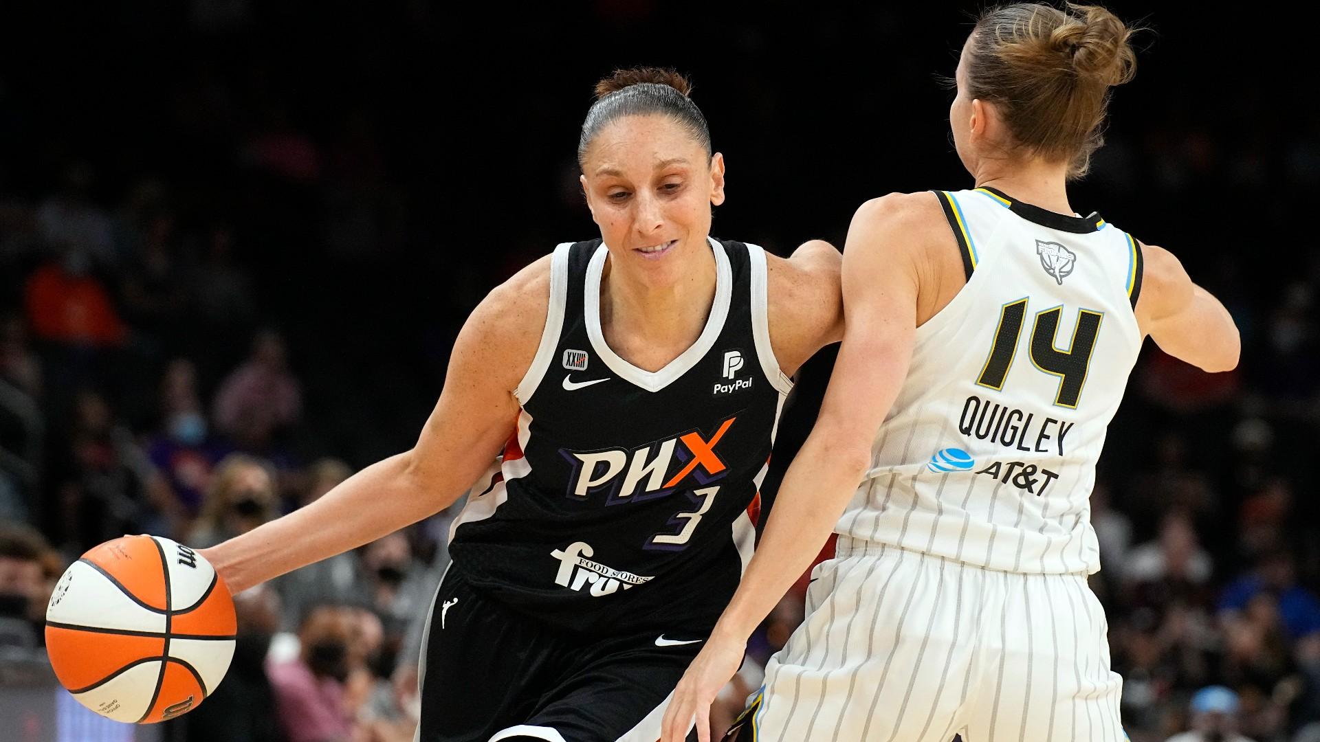 Phoenix Mercury guard Diana Taurasi drives on Chicago Sky guard Allie Quigley (14) during the first half of Game 2 of basketball's WNBA Finals, Wednesday, Oct. 13, 2021, in Phoenix. (AP Photo / Rick Scuteri)