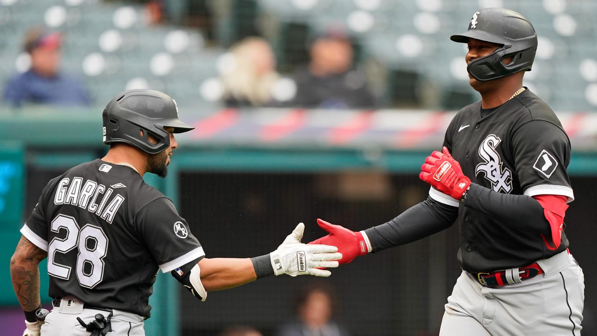Chicago White Sox’s Eloy Jimenez, right, celebrates with Leury Garcia after Jimenez hit a solo home run in the second inning in the first baseball game of a doubleheader against the Cleveland Indians, Thursday, Sept. 23, 2021, in Cleveland. (AP Photo / Tony Dejak)