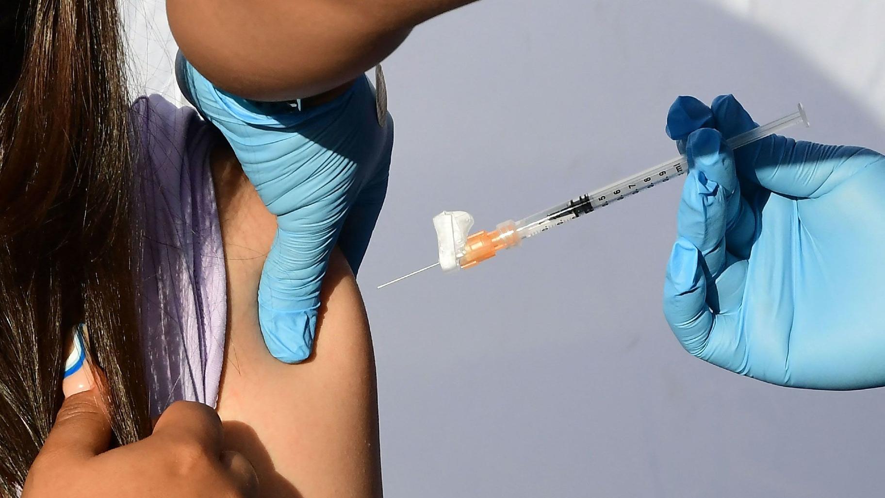 COVID-19 vaccines that have been updated to defend against XBB.1.5 are expected to be available in mid-September. (Frederic J. Brown / AFP / Getty Images)