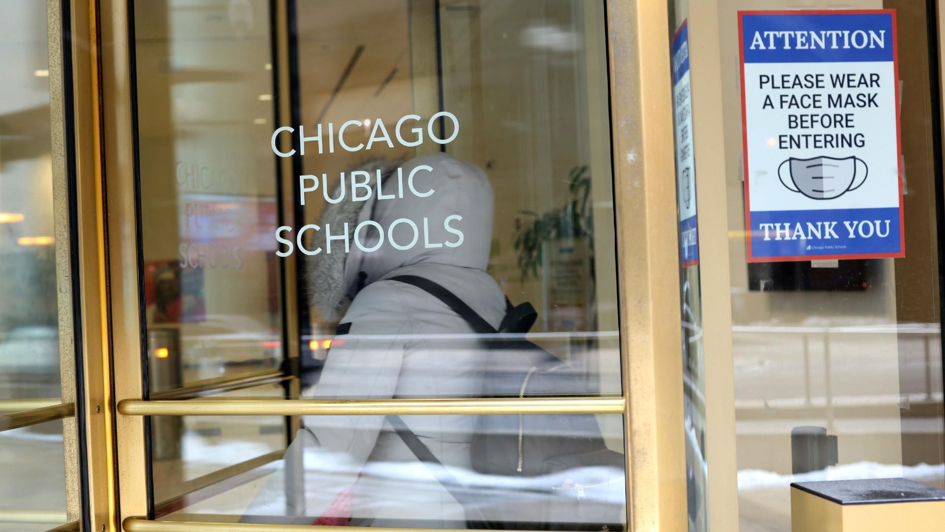 Chicago public schools are closed for a second day as city school officials and the teachers union remain at odds over whether it’s safe to return to the classroom, and pictured, a sign is displayed at the entrance of the headquarters for Chicago Public Schools on Jan. 5, in Chicago, Illinois. (Scott Olson / Getty Images)