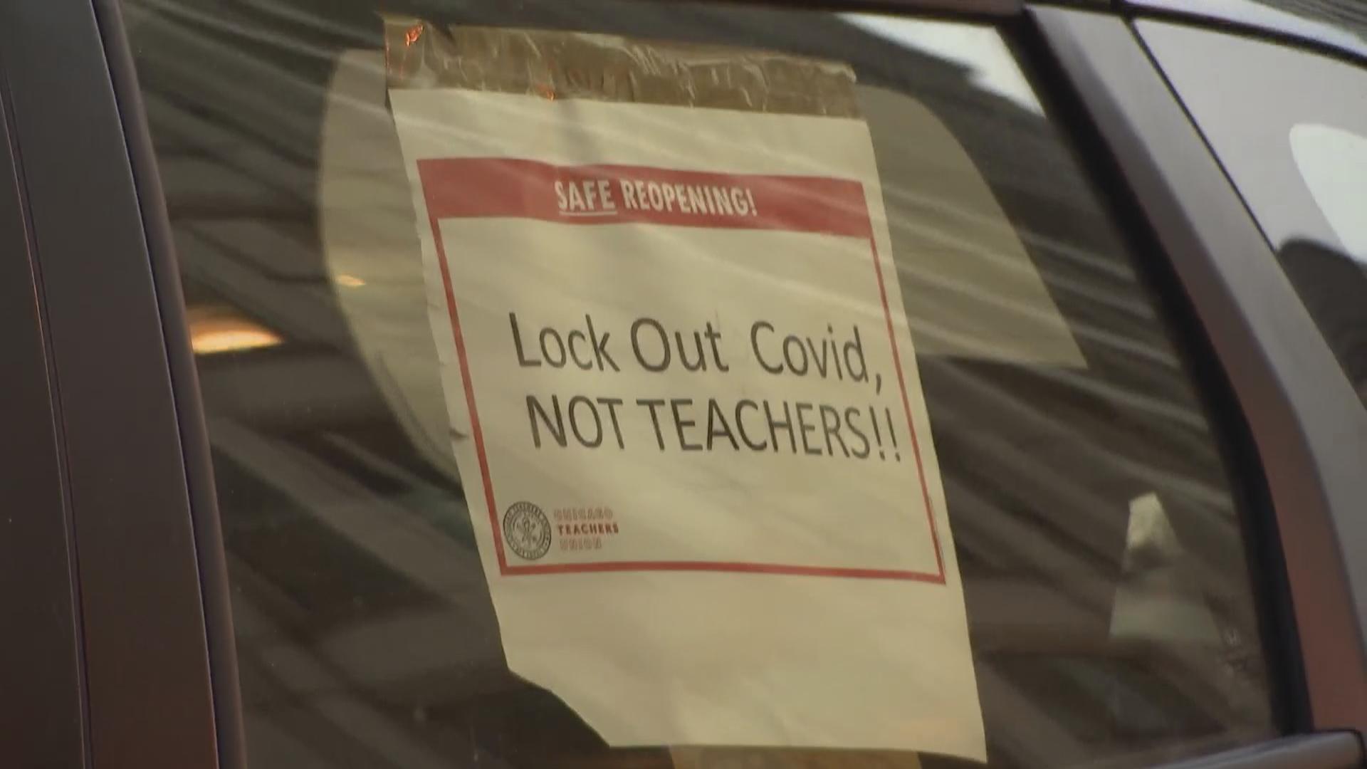 A sign supporting the Chicago Teachers Union during its car caravan rally on Wednesday, Jan. 5, 2022. (WTTW News)