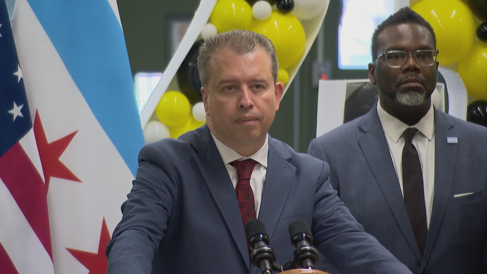 Chicago Public Schools CEO Pedro Martinez speaks at Orr Academy High School on June 7, 2023, beside Mayor Brandon Johnson. (WTTW News)