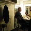 After talking with his staff, Mayor Emanuel goes into makeup.