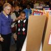 Toni Preckwinkle speaks with David Mesa about his science project.