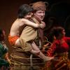 Akash Chopra (Mowgli) and Kevin Carolan (Baloo) in Tony Award winner Mary Zimmerman’s new musical adaption of The Jungle Book at Goodman Theatre