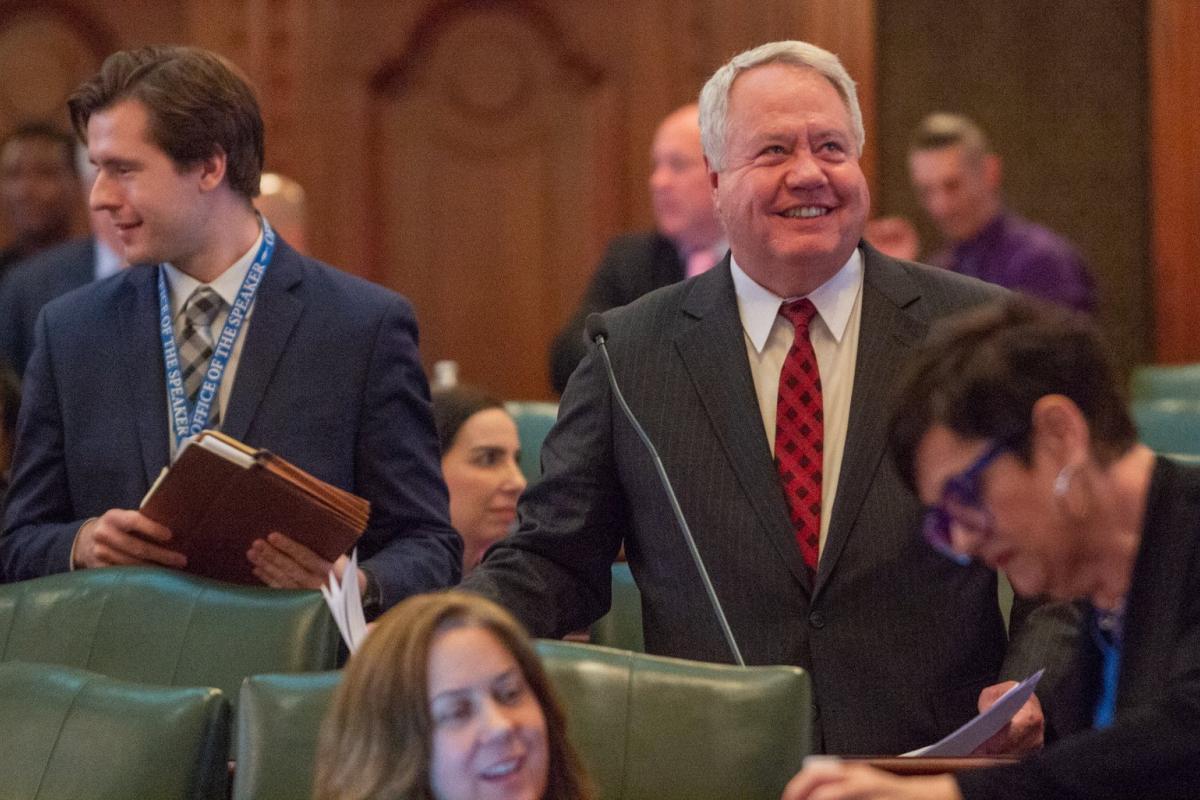 State Rep. Jay Hoffman, D-Swansea, smiles on the House floor after Republicans chose not to debate his proposed election law changes, instead voting present then leaving the chamber for a news conference. (Jerry Nowicki / Capitol News Illinois)