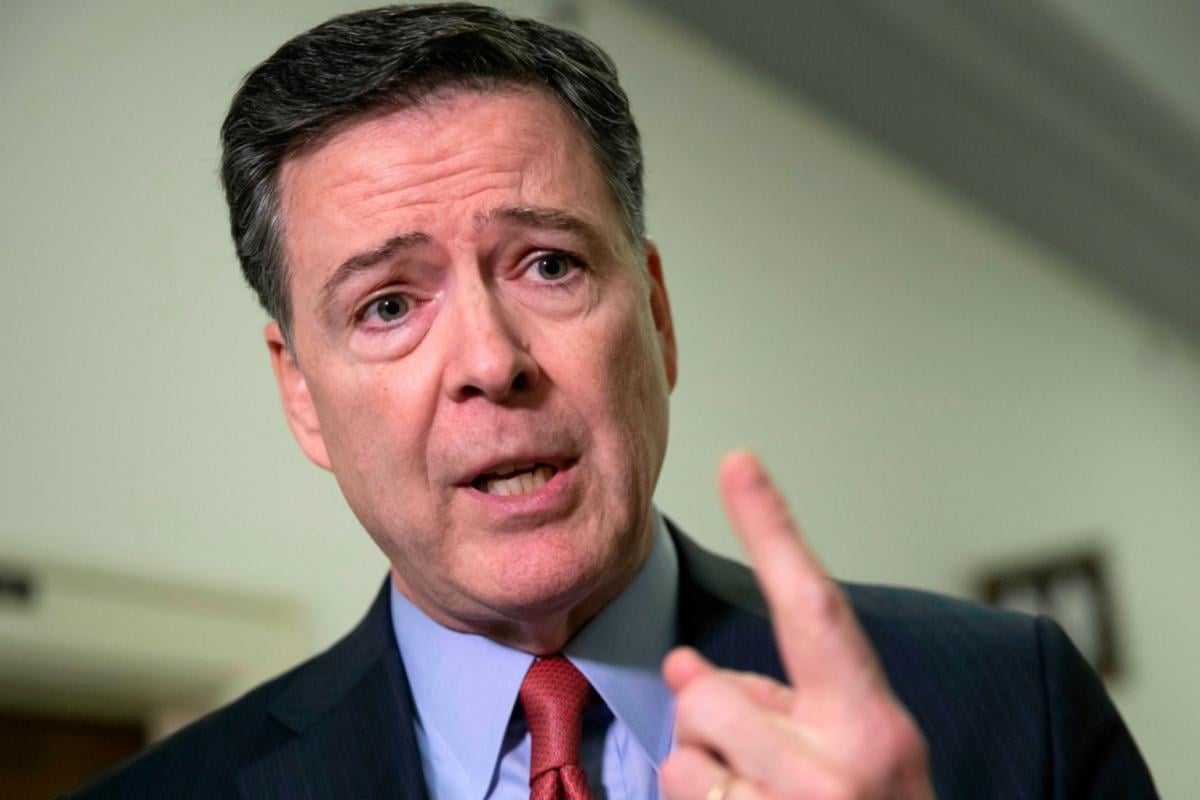 Former FBI Director James Comey speaks to reporters on Capitol Hill in Washington, Dec. 17, 2018. (AP Photo / J. Scott Applewhite, File)