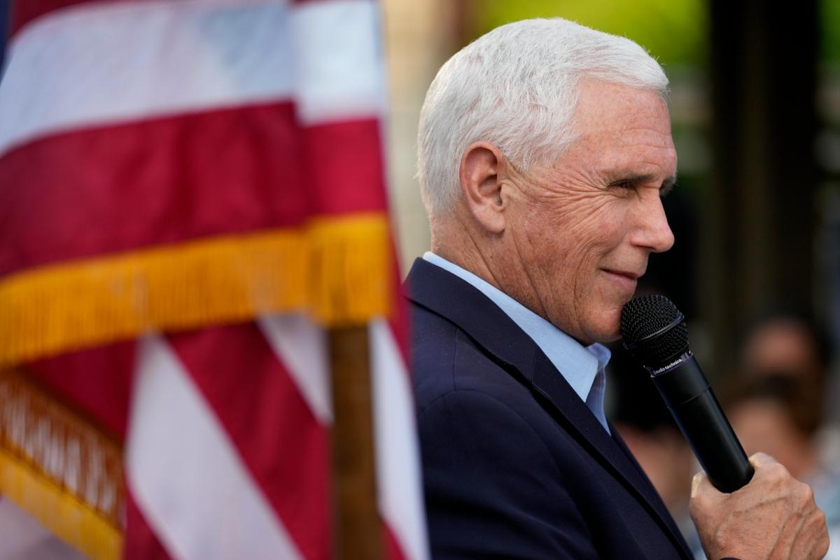 Former Vice President Mike Pence talks with local residents during a meet and greet on May 23, 2023, in Des Moines, Iowa. (AP Photo / Charlie Neibergall)