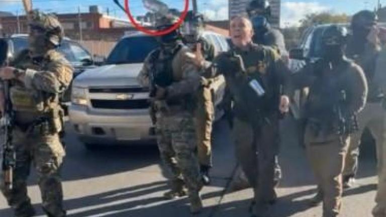 An image taken from a video entered as evidence in the court case, showing Border Patrol chief Gregory Bovino firing tear gas, circled in red by lawyers for the Chicago Headline Club, at a crowd of protestors. (Provided)