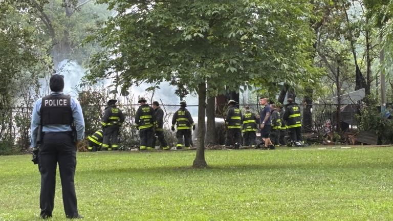A fire broke out in a homeless encampment along the North Shore Channel on July 28, 2025. (Crystin Immel / WTTW News)