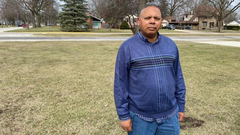 Ken Maurice stands outside his home in Aurora on March 18, 2025. (Nick Blumberg / WTTW News)
