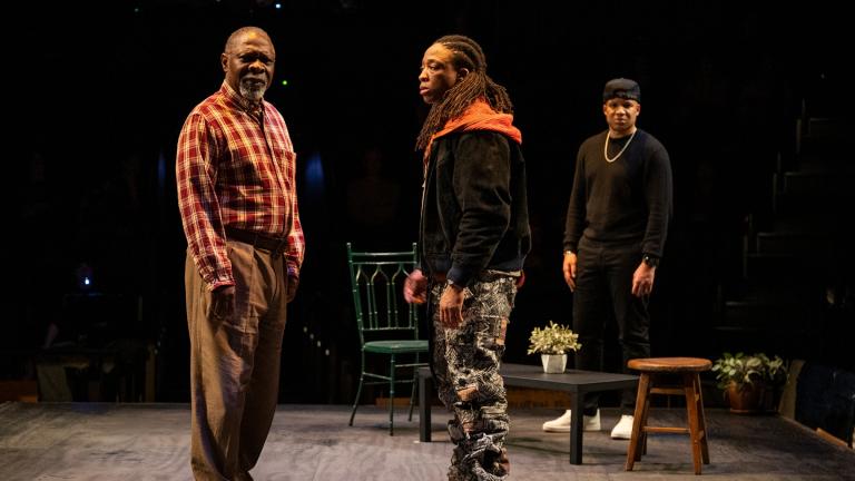 (left to right) Michael Potts, Esco Jouléy and ensemble member Glenn Davis in Steppenwolf Theatre Company’s world premiere of “Windfall.” (Michael Brosilow)
