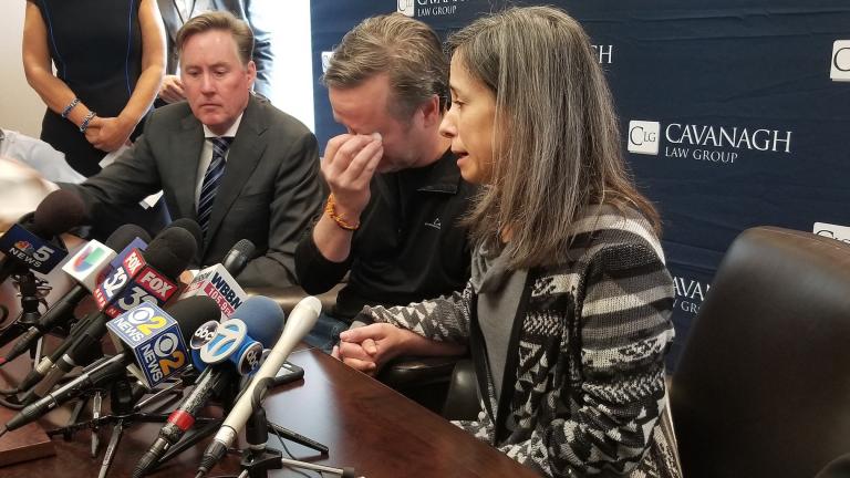 Tom Wilder, center, and Lucia Morales, right, say they’re unsure if their son Rylan will ever regain full use of his arm after he was shot last week in an incident involving bank robbers and police. (Matt Masterson / WTTW News)