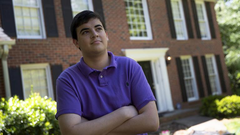College student Jake Mershon poses in front of his parents home Thursday, May 7, 2020, in Roswell Ga. (AP Photo / John Bazemore)