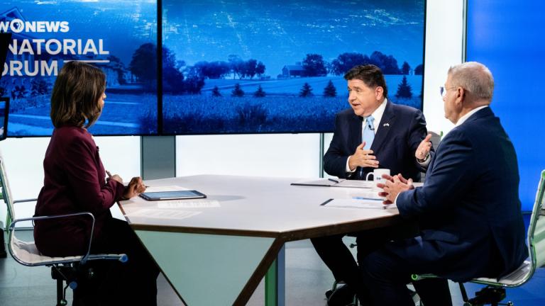 Brandis Friedman moderates a candidate forum with Gov. JB Pritzker and Darren Bailey on Oct. 13, 2025. (Ken Carl for WTTW)