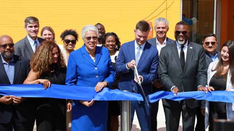 A ribbon-cutting ceremony for a new 211 call center in Grand Crossing on Sept. 2, 2025. The center, 7247 S. South Chicago Ave., is located at the tech workforce hub Xchange Chicago. (Courtesy of United Way of Metro Chicago)