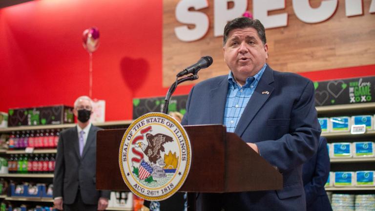 Gov. JB Pritzker speaks at a Springfield grocery store in 2022 in favor of temporarily eliminating the state’s grocery tax. Four years later, the tax will end permanently, at least statewide. (Jerry Nowicki / Capitol News Illinois)