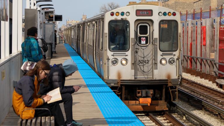 Passengers for the CTA Red Line wait for their train to arrive in 2023. (Andrew Adams / Capitol News Illinois)