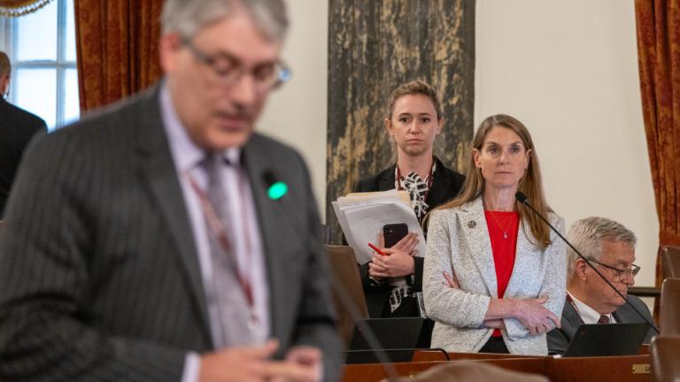 State Sen. Laura Fine, D-Glenview, and an aide watch as state Sen. Michael Halpin, D-Rock Island, explains why he will vote no on her bill to regulate the carbon capture and sequestration industry. (Andrew Adams / Capitol News Illinois)